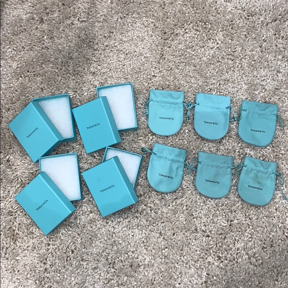 Bundle of Tiffany jewelry boxes and bags